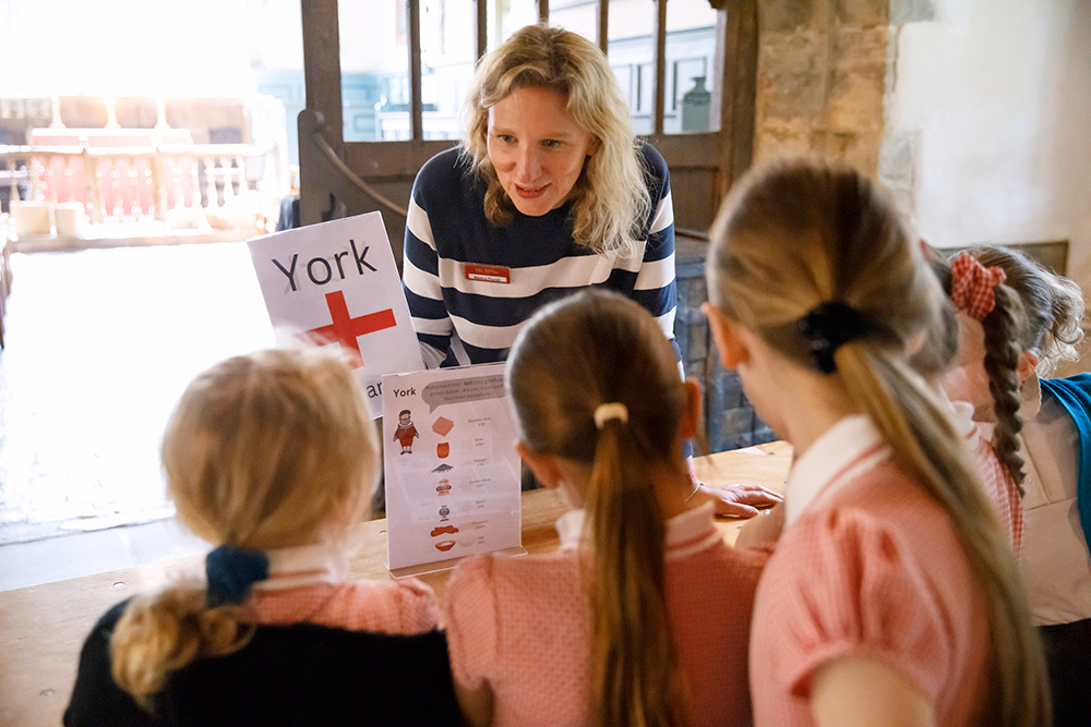 Education Exec Rebecca Francis talking to children about trade in Tudor York